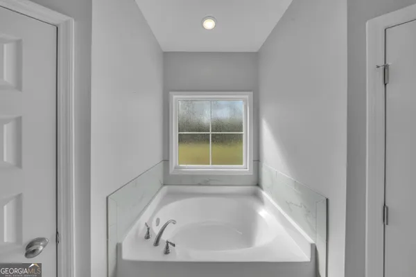 a bathroom with a bathtub