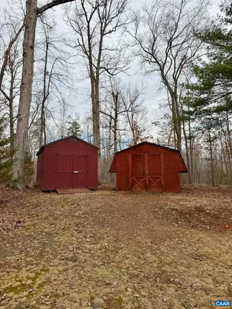 a kitchen with stainless steel appliances granite countertop a stove and a microwave