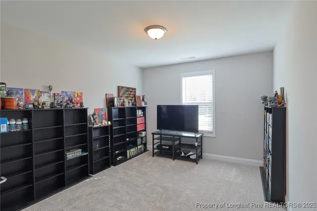 a view of a workspace with furniture