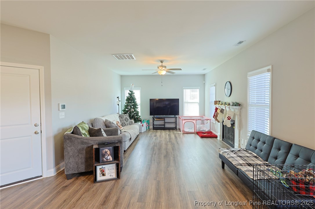 7810 Rufus Johnson Road St. Pauls, NC 28384 - Photo 6 of 24 a living room with furniture and a flat screen tv