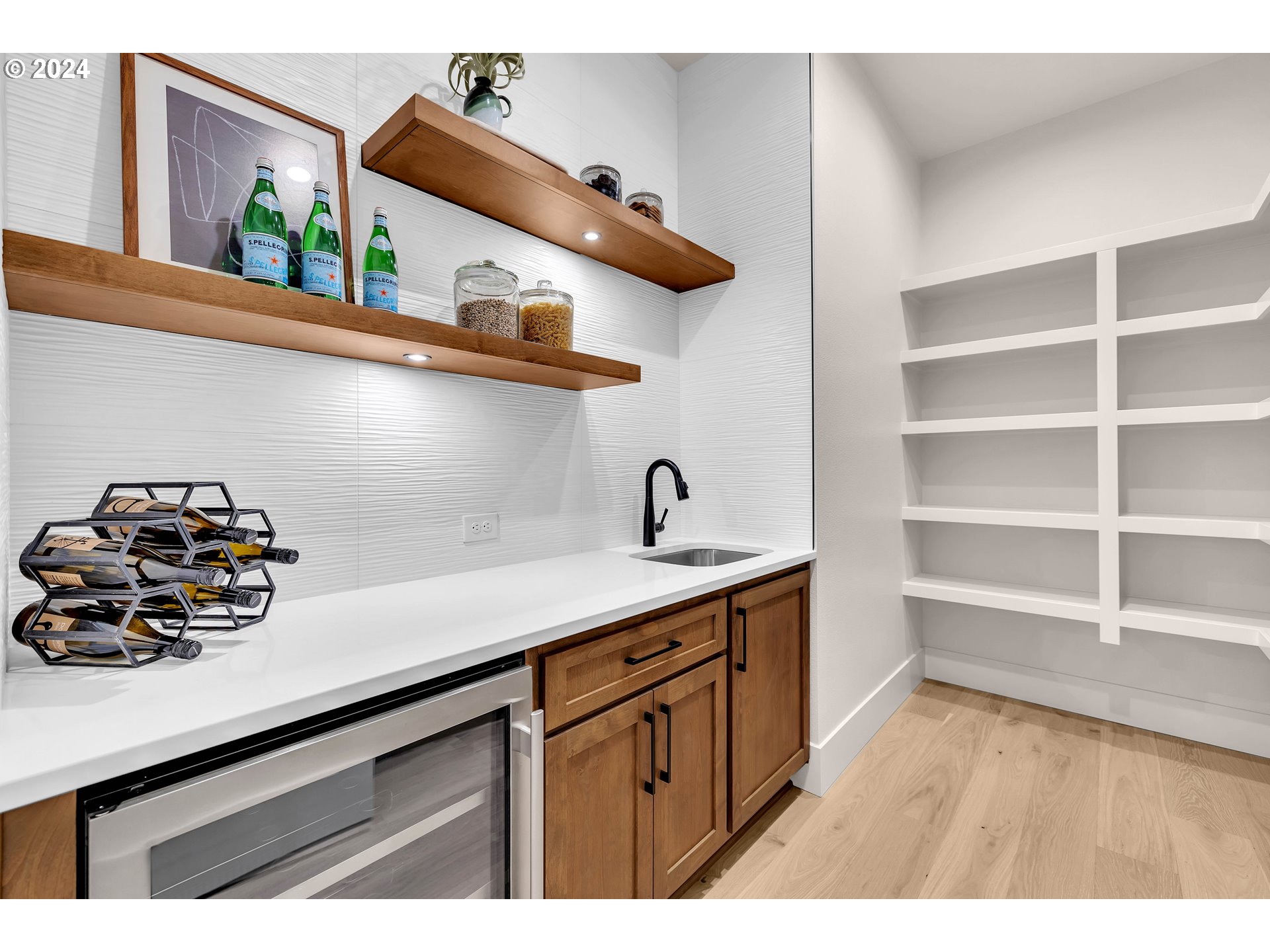 2507 Northeast 178th Street Ridgefield, WA 98642 - Photo 21 of 48 a kitchen with a sink a stove and cabinets