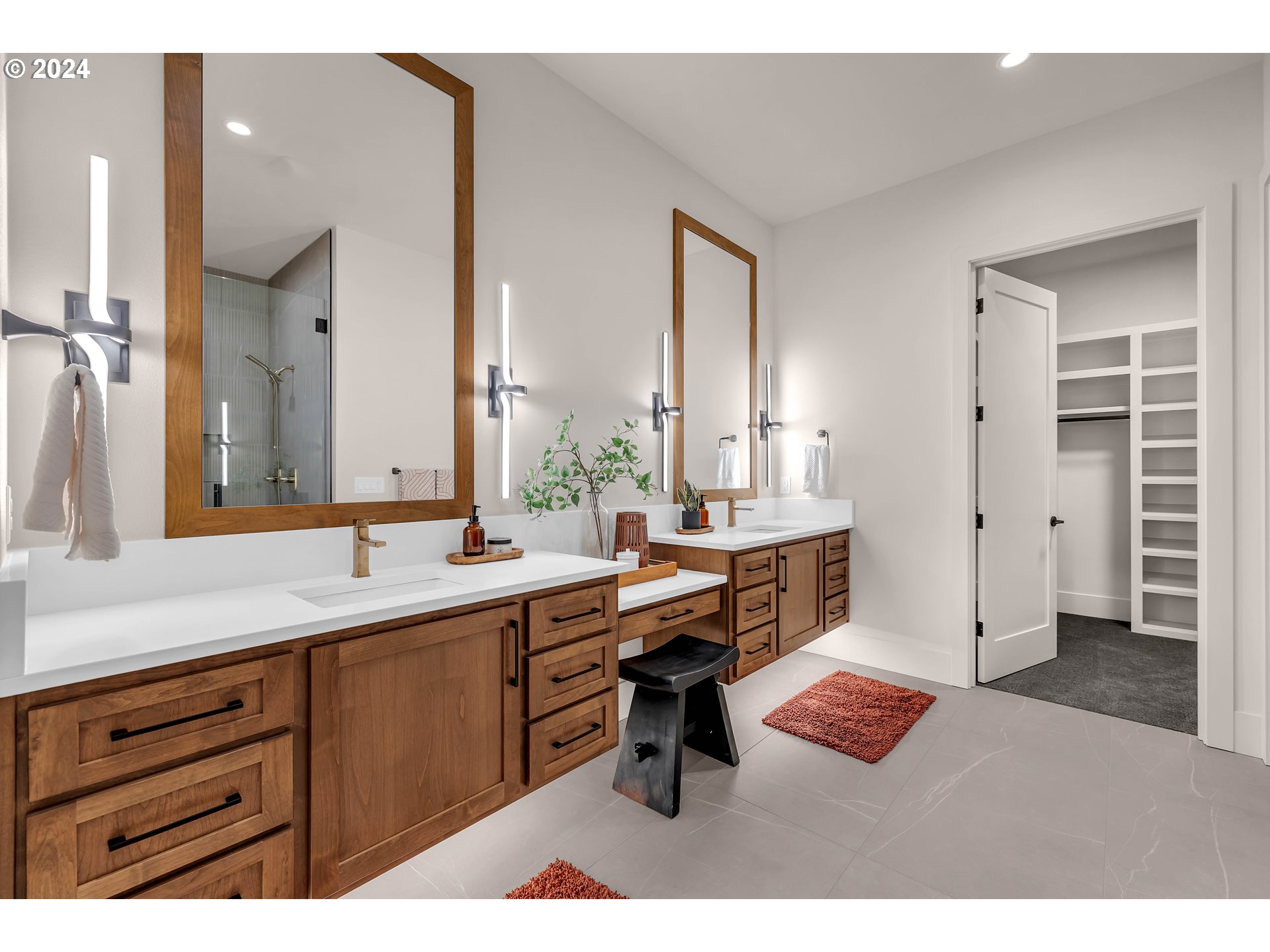 2507 Northeast 178th Street Ridgefield, WA 98642 - Photo 26 of 48 a spacious bathroom with a sink double vanity granite tub shower and a mirror