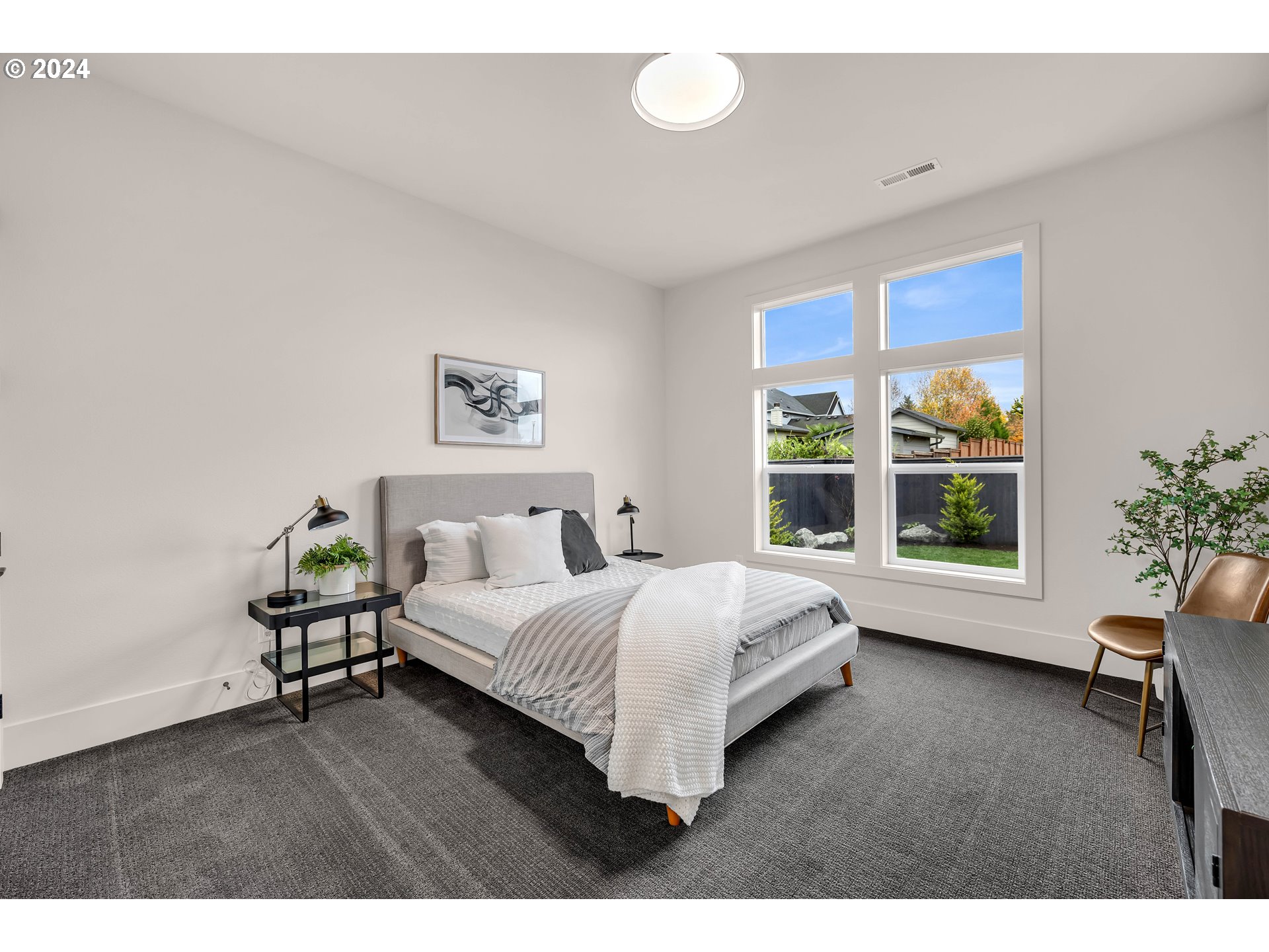 2507 Northeast 178th Street Ridgefield, WA 98642 - Photo 33 of 48 a living room with a bed furniture and a window