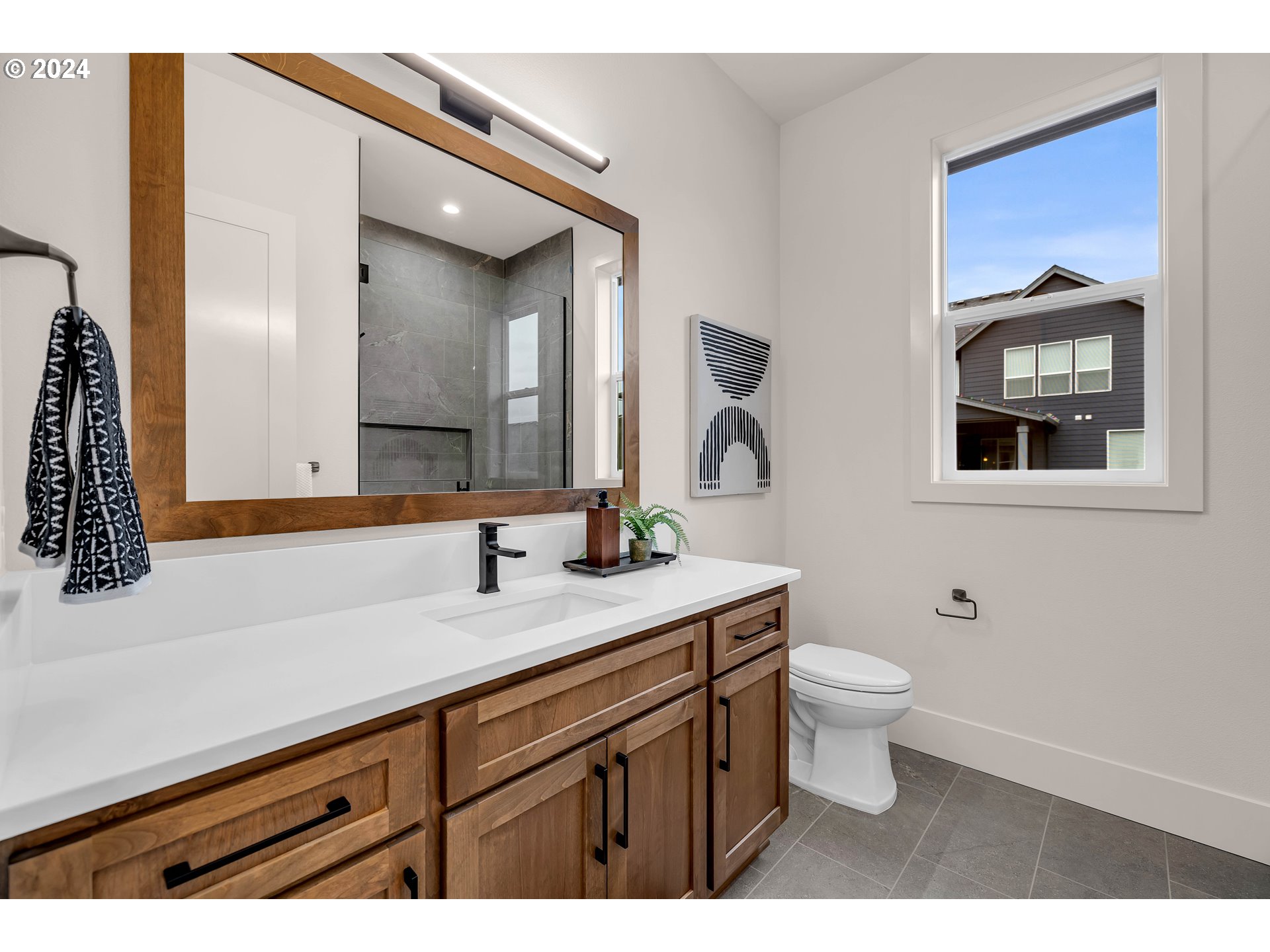 2507 Northeast 178th Street Ridgefield, WA 98642 - Photo 35 of 48 a bathroom with a toilet sink and mirror