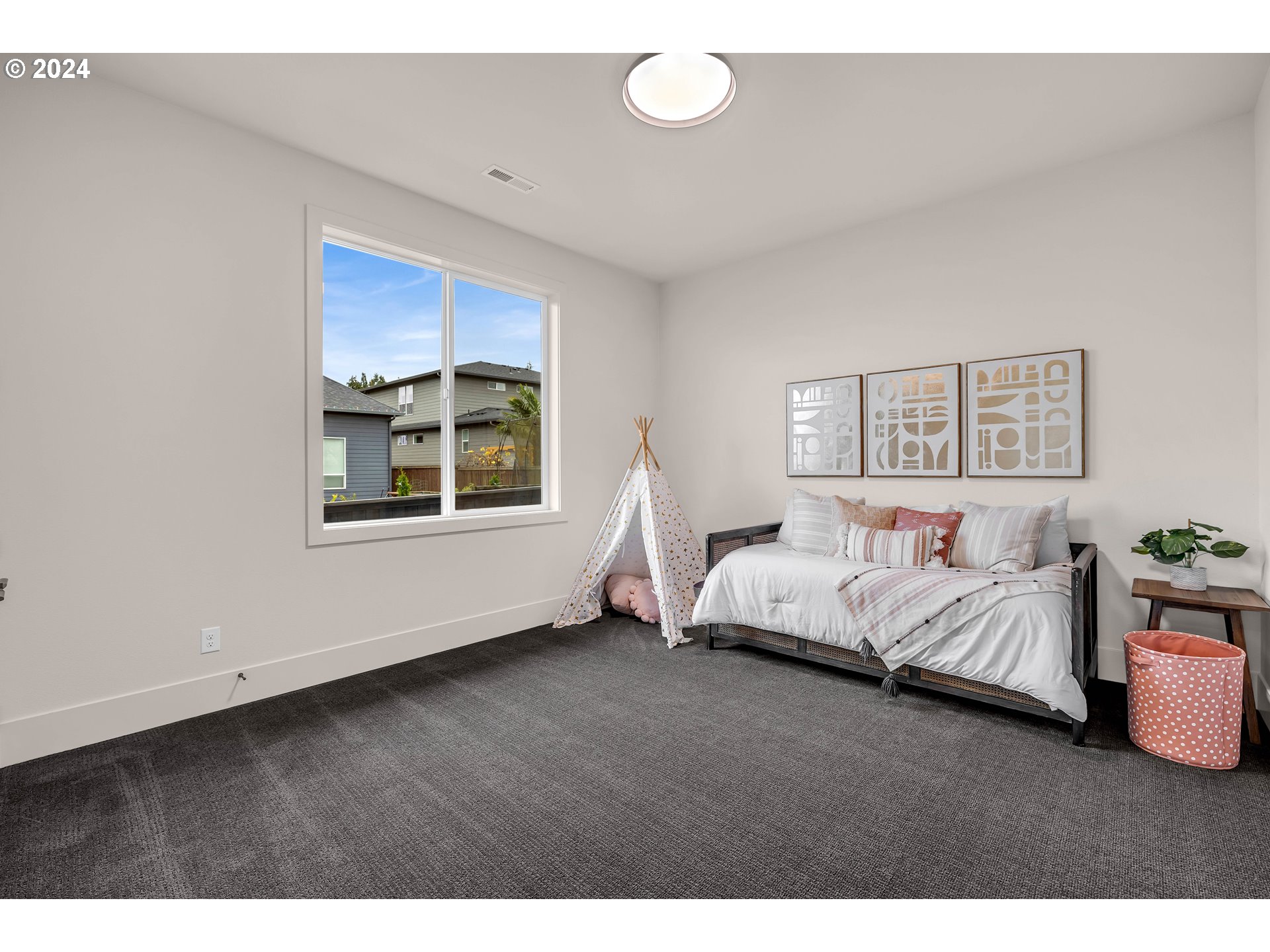 2507 Northeast 178th Street Ridgefield, WA 98642 - Photo 39 of 48 a spacious bedroom with a bed and a window