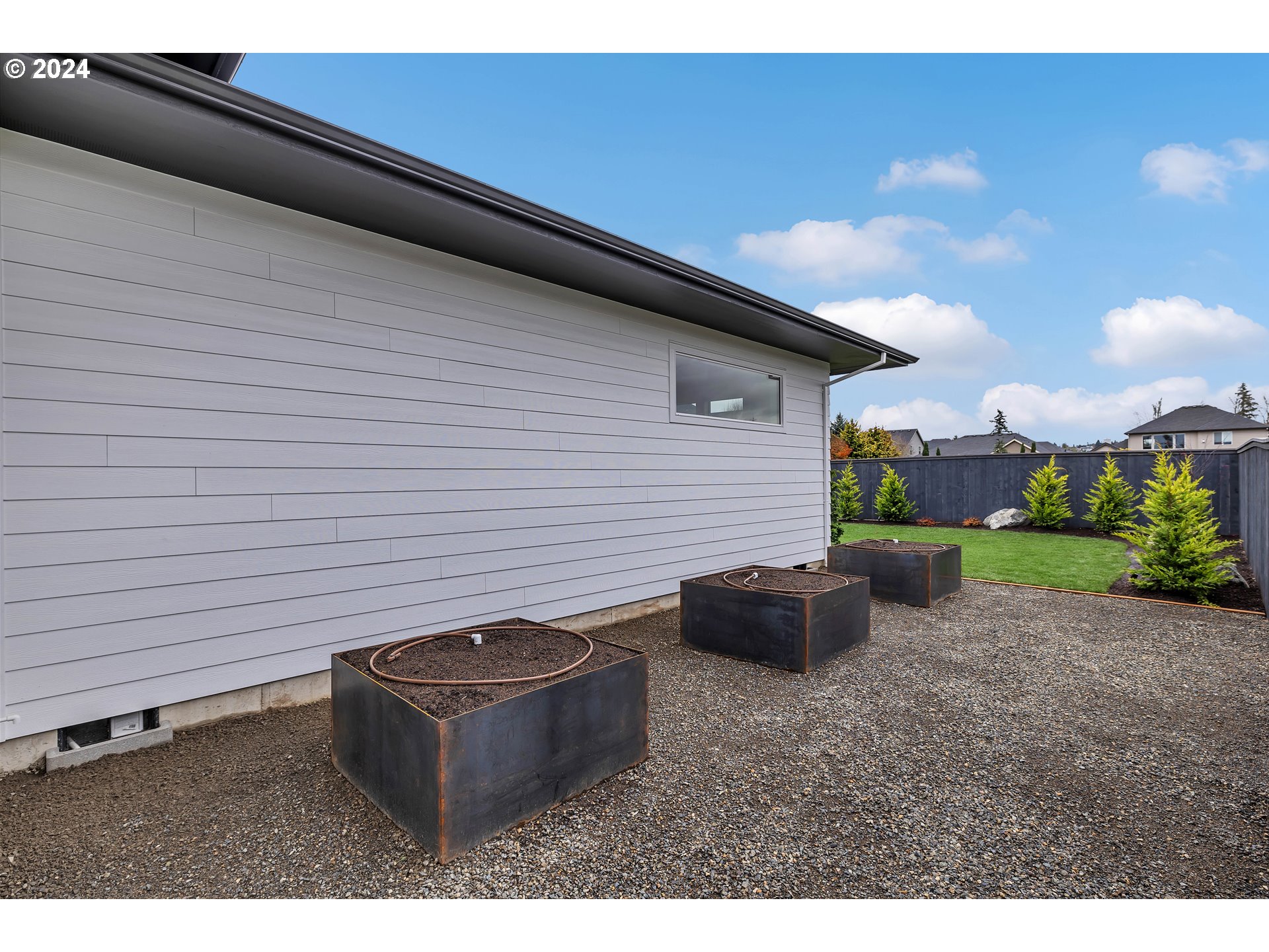 2507 Northeast 178th Street Ridgefield, WA 98642 - Photo 47 of 48 a backyard of a house with outdoor seating