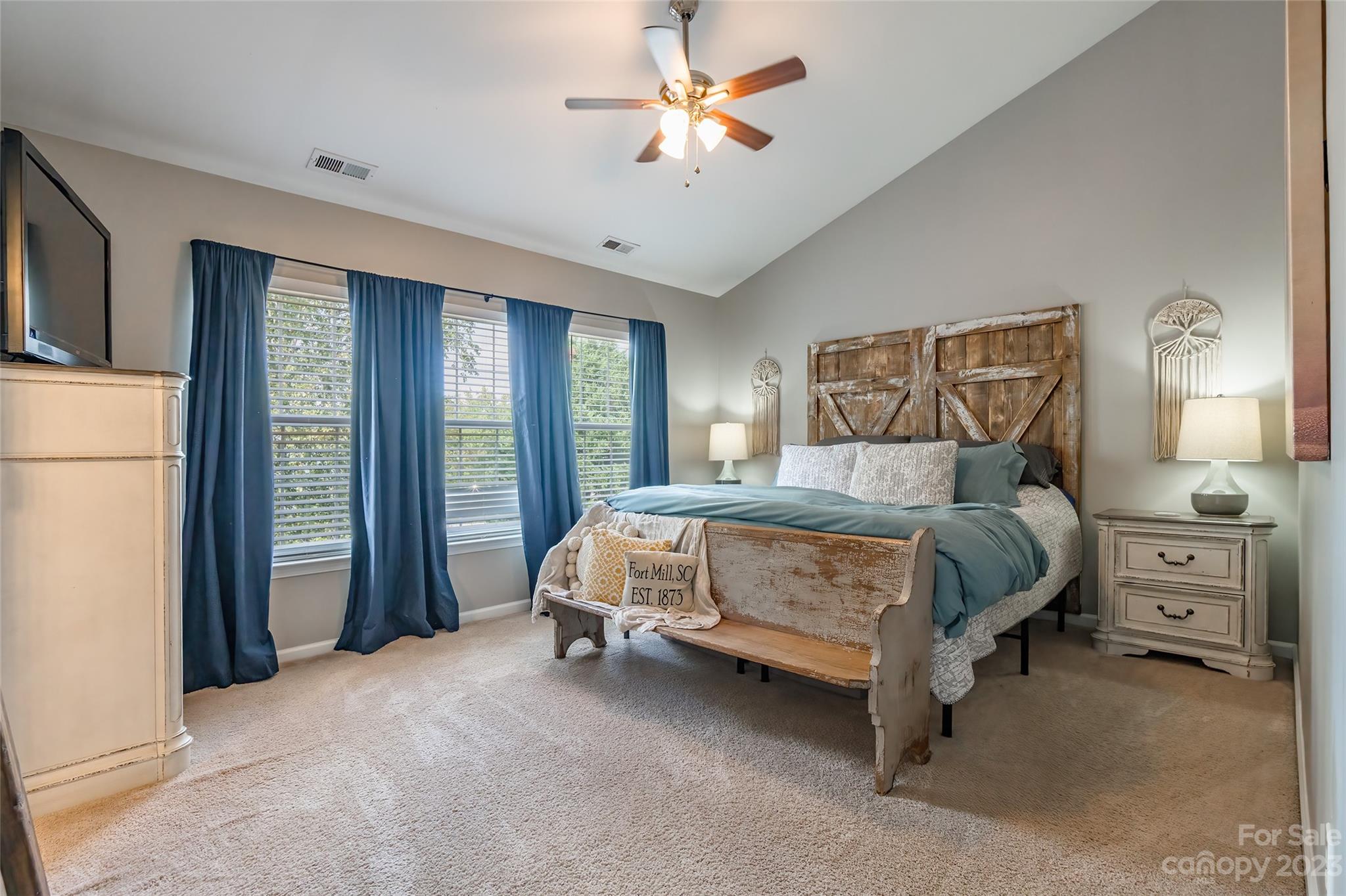 3114 Tanzanite Circle Fort Mill, SC 29708 - Photo 15 of 31 a bed sitting in a spacious bedroom next to a window