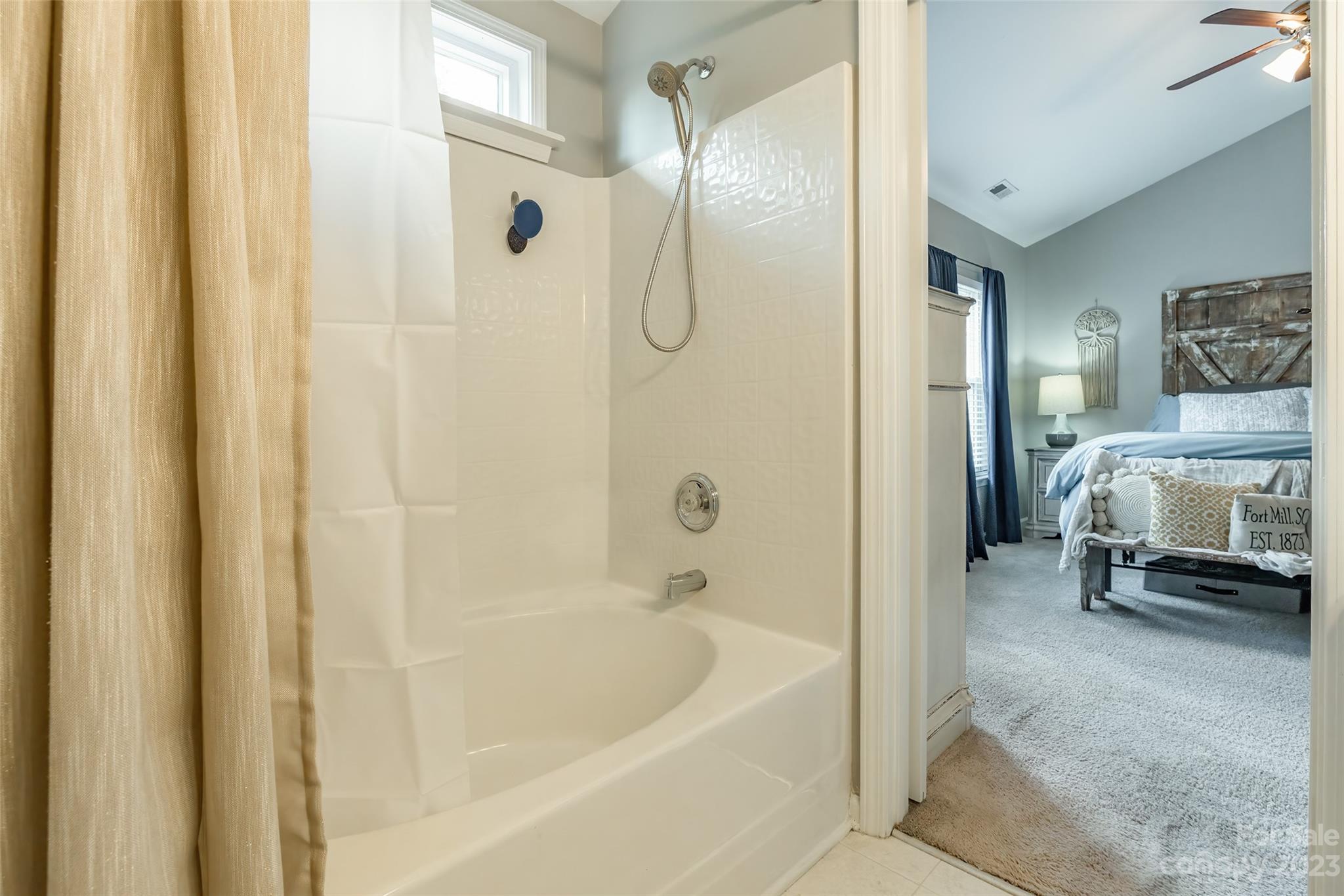3114 Tanzanite Circle Fort Mill, SC 29708 - Photo 18 of 31 a en suite bathroom with a tub and shower