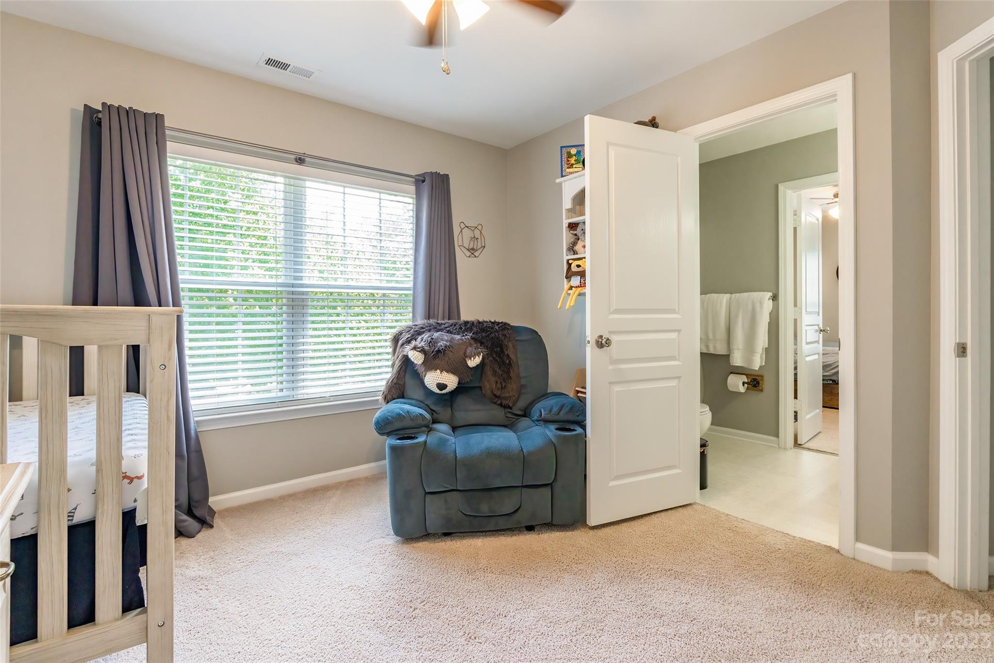 3114 Tanzanite Circle Fort Mill, SC 29708 - Photo 21 of 31 a living room with furniture and a window