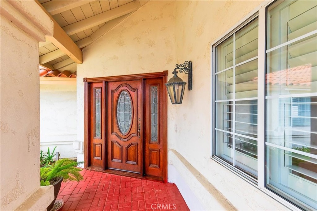 1766 Rabbit Hill Fallbrook, CA 92028 - Photo 14 of 75 a view of front door with potted plants