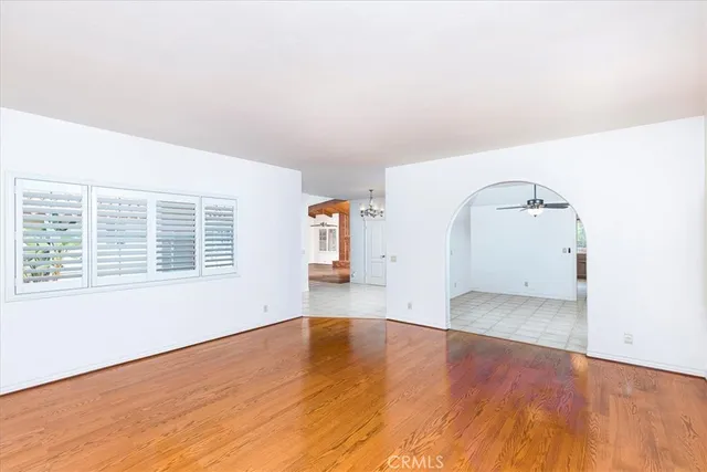 a kitchen that has a sink and a stove top oven