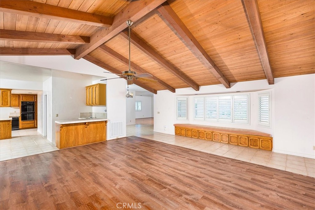1766 Rabbit Hill Fallbrook, CA 92028 - Photo 20 of 75 a spacious bedroom with a bed and wooden floors