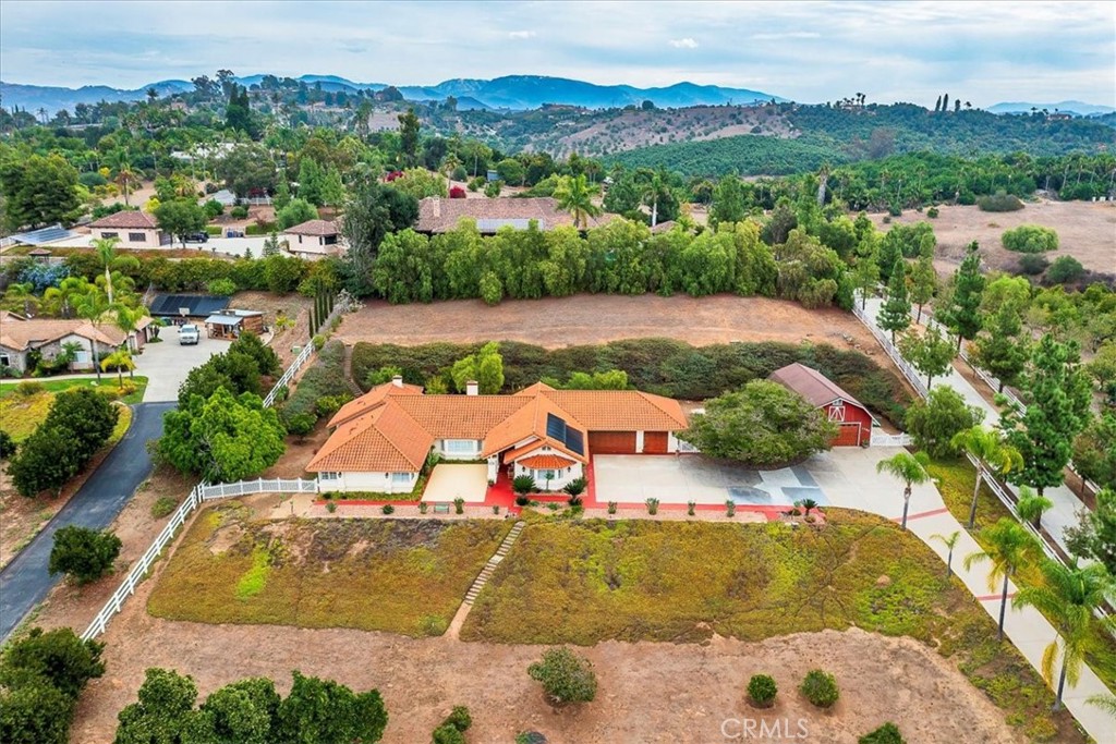1766 Rabbit Hill Fallbrook, CA 92028 - Photo 3 of 75 an aerial view of a house with a swimming pool