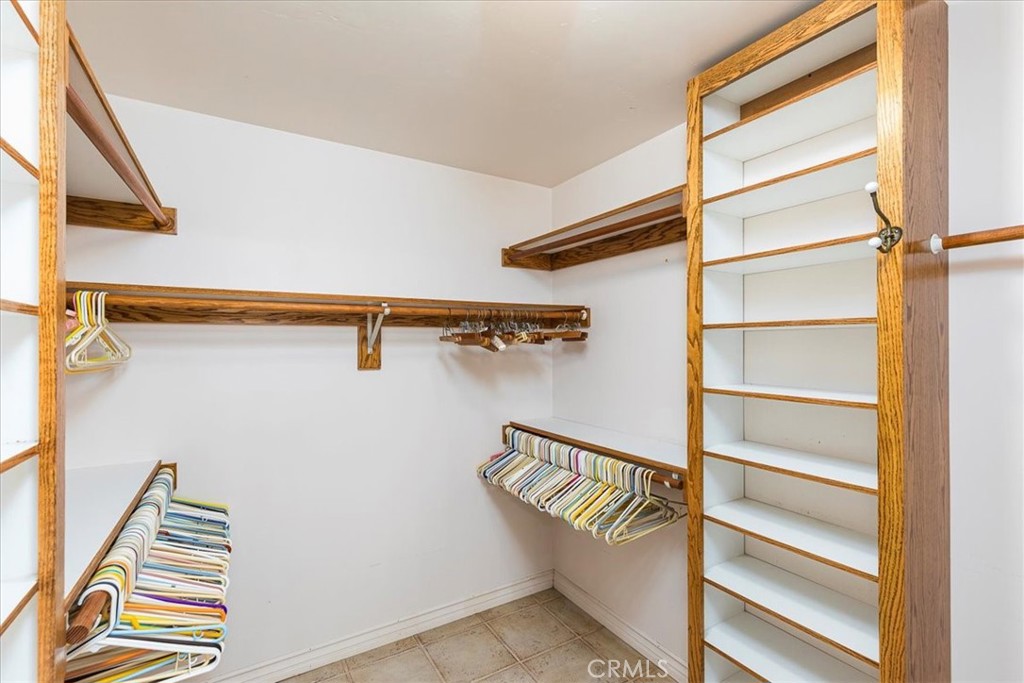 1766 Rabbit Hill Fallbrook, CA 92028 - Photo 32 of 75 a view of walk in closet with empty racks