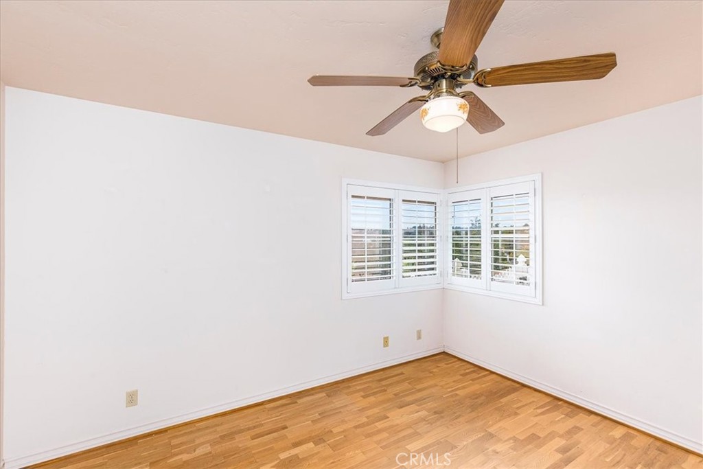1766 Rabbit Hill Fallbrook, CA 92028 - Photo 37 of 75 an empty room with a window and a fan