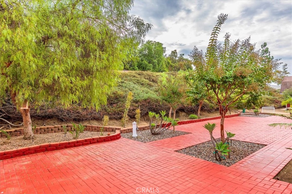 1766 Rabbit Hill Fallbrook, CA 92028 - Photo 44 of 75 a view of a swimming pool with an outdoor space and seating area