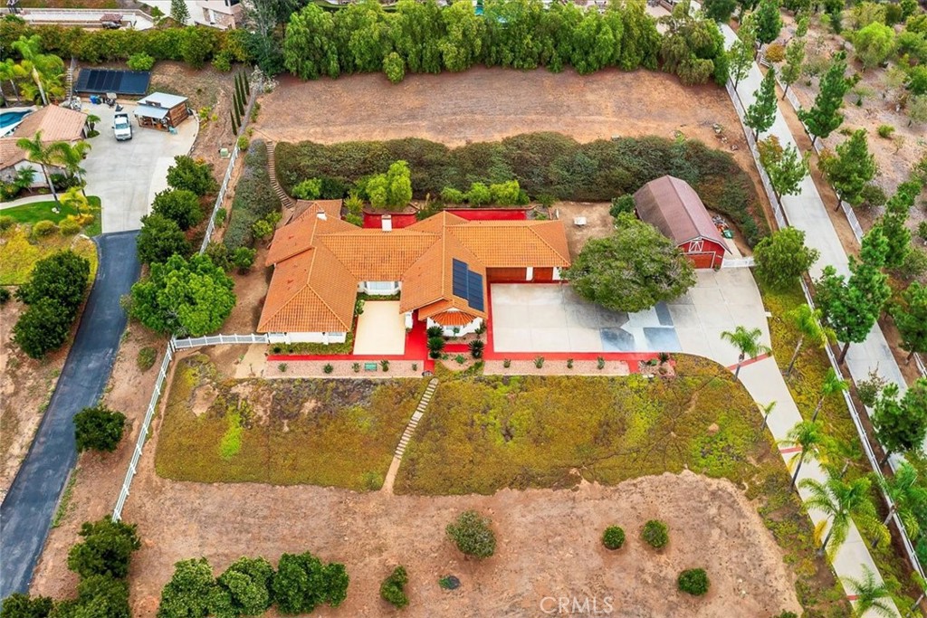 1766 Rabbit Hill Fallbrook, CA 92028 - Photo 68 of 75 an aerial view of a house with a yard and lake view