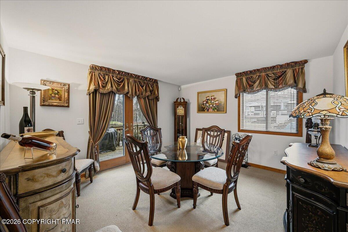 3176 Bluebird Drive Bushkill, PA 18324 - Photo 14 of 37 a dining room with furniture and window