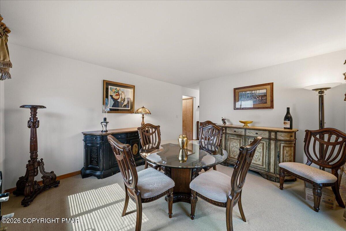 3176 Bluebird Drive Bushkill, PA 18324 - Photo 15 of 37 a view of a livingroom and dining room