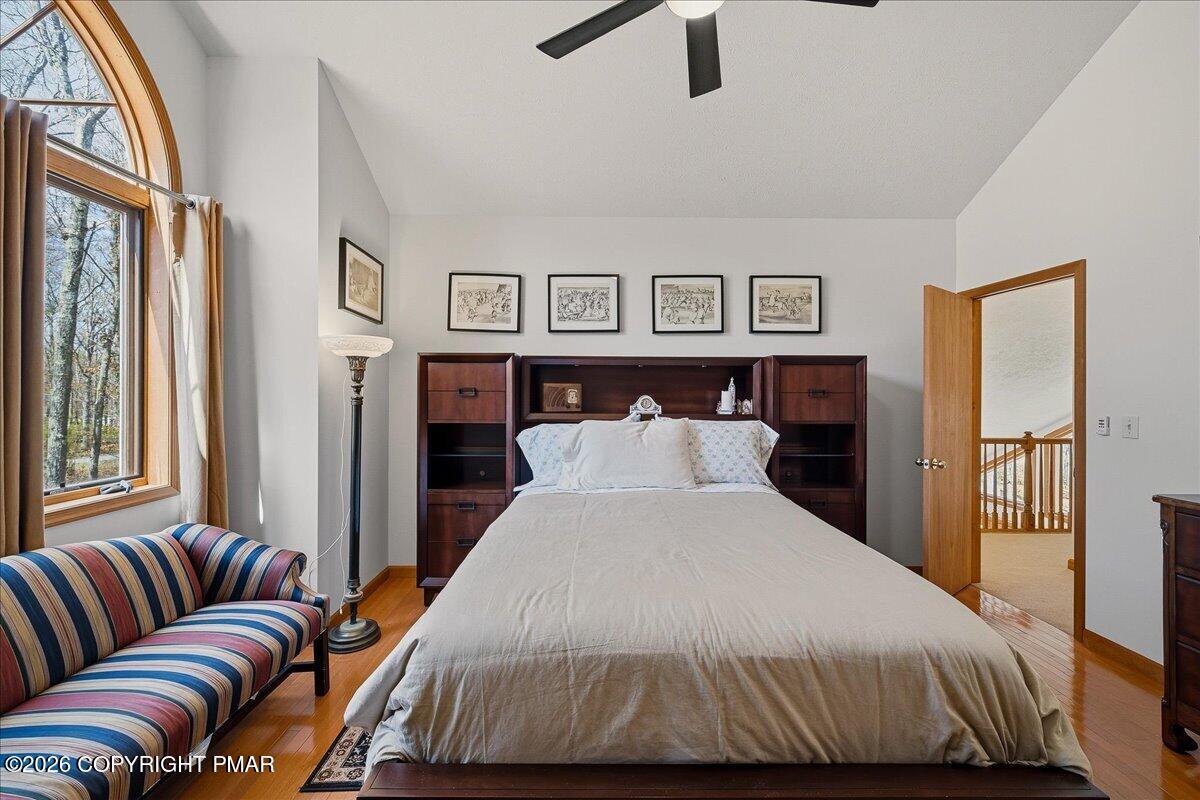 3176 Bluebird Drive Bushkill, PA 18324 - Photo 22 of 37 a bedroom with a large bed and furniture