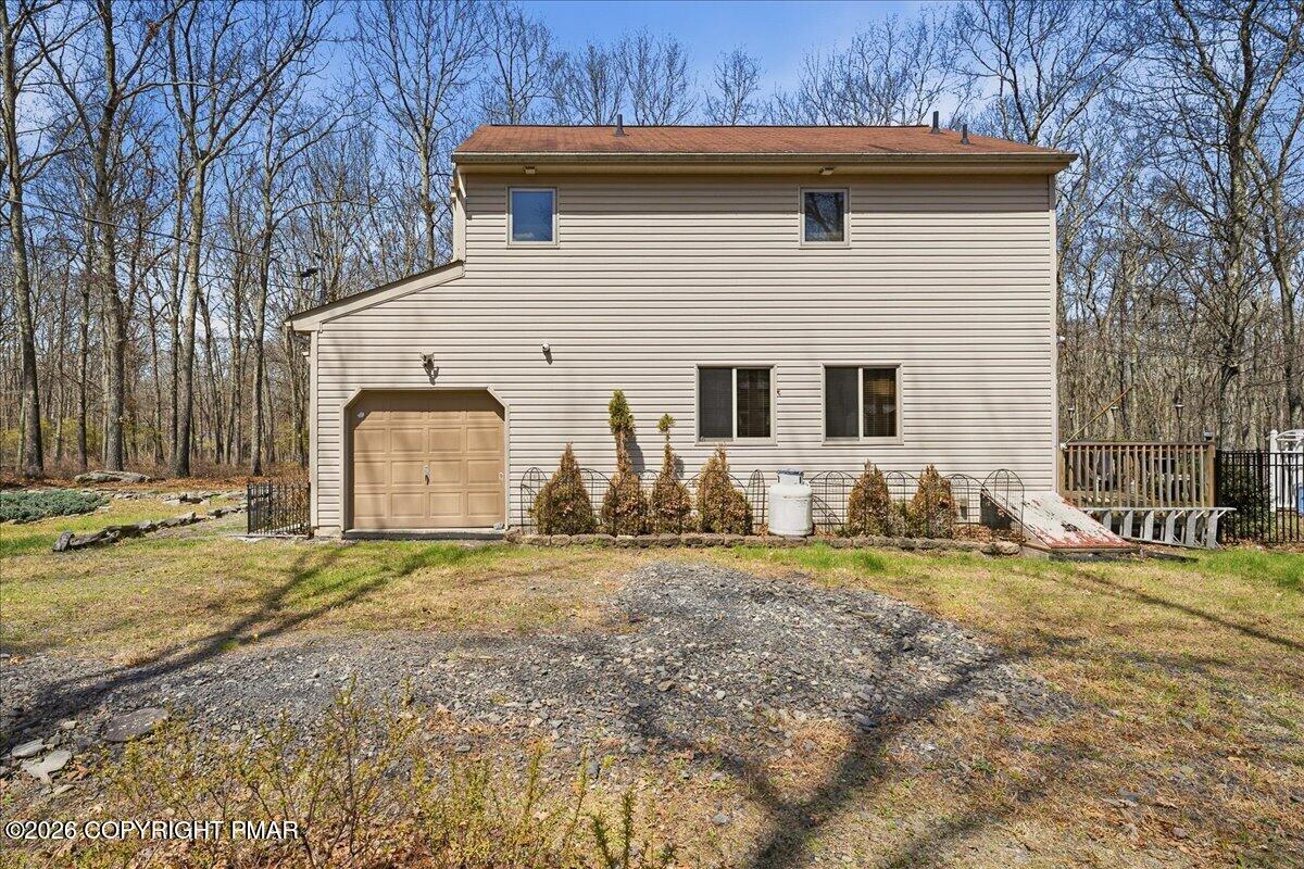 3176 Bluebird Drive Bushkill, PA 18324 - Photo 29 of 37 a view of a house with backyard
