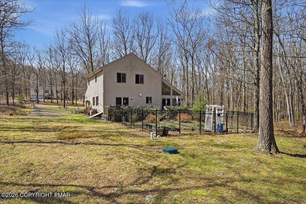 3176 Bluebird Drive Bushkill, PA 18324 - Photo 30 of 37 a view of a house with a yard