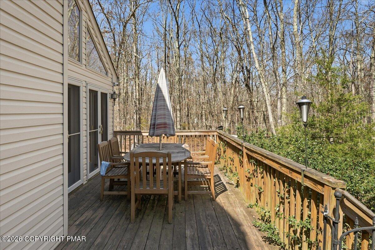 3176 Bluebird Drive Bushkill, PA 18324 - Photo 32 of 37 a view of balcony with furniture and wooden deck