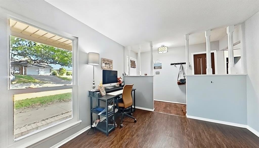 5016 St Lawrence Road Fort Worth, TX 76103 - Photo 8 of 22 a view of a workspace with furniture and a window