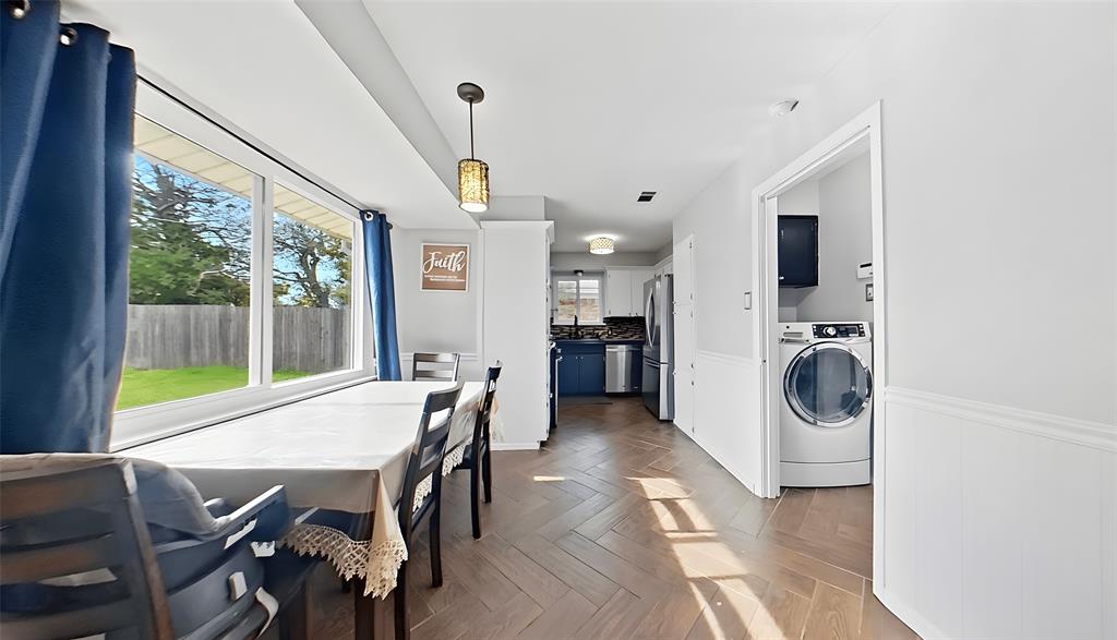5016 St Lawrence Road Fort Worth, TX 76103 - Photo 9 of 22 a view of a dining room with furniture window and outside view