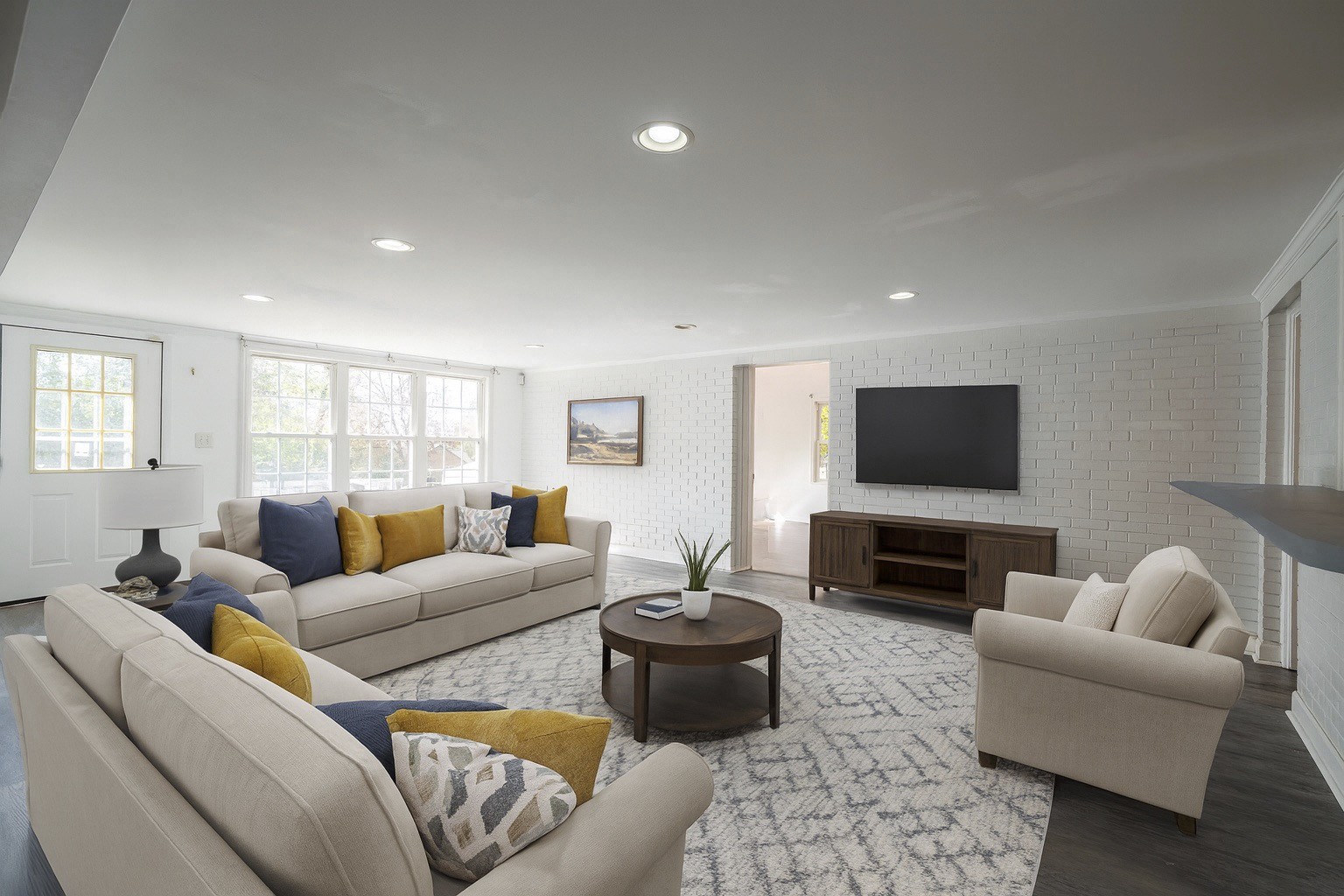 523 Highland Avenue Pulaski, TN 38478 - Photo 19 of 44 a living room with furniture and a flat screen tv