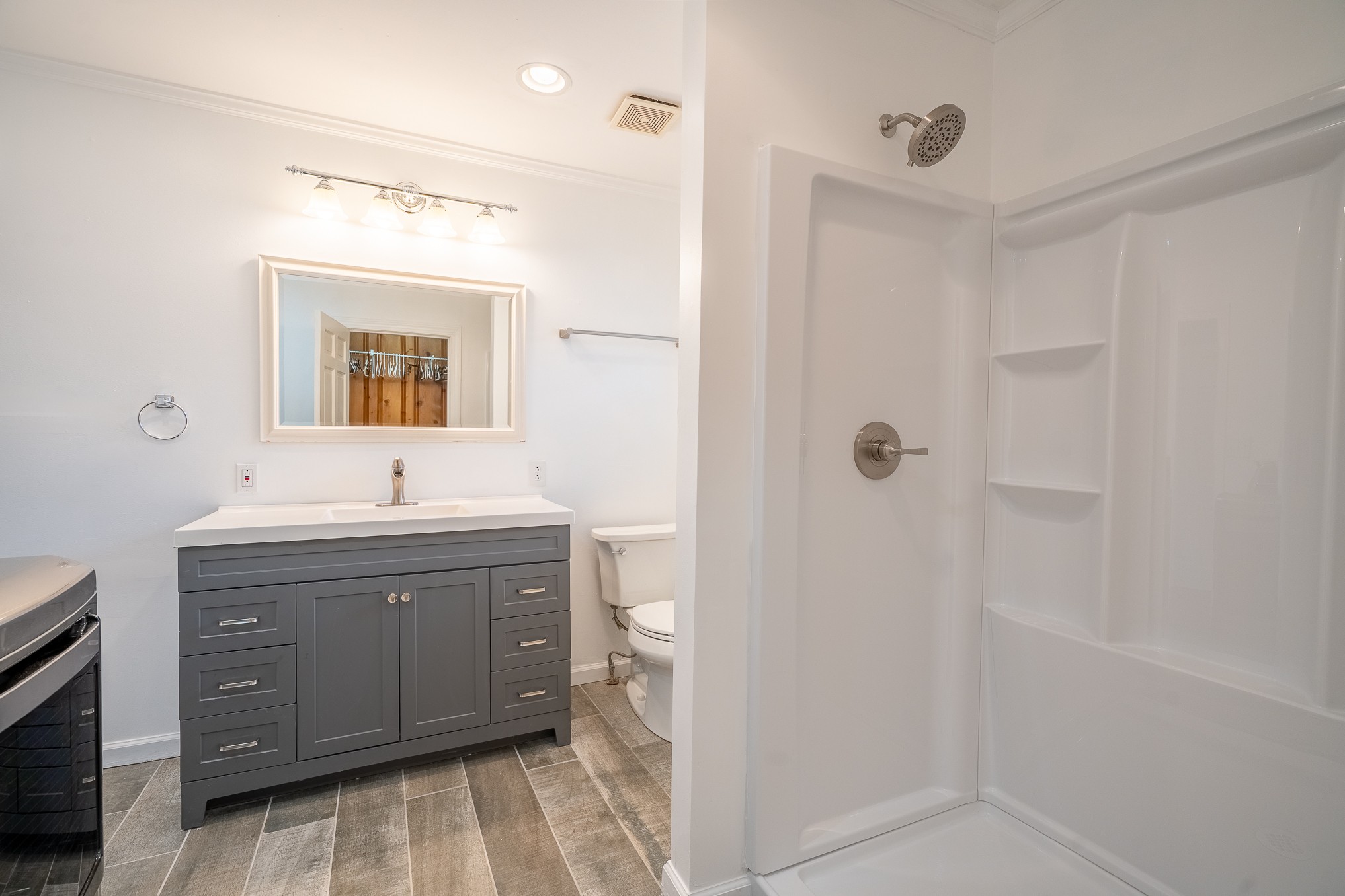 523 Highland Avenue Pulaski, TN 38478 - Photo 28 of 44 a bathroom with a double vanity sink mirror and shower