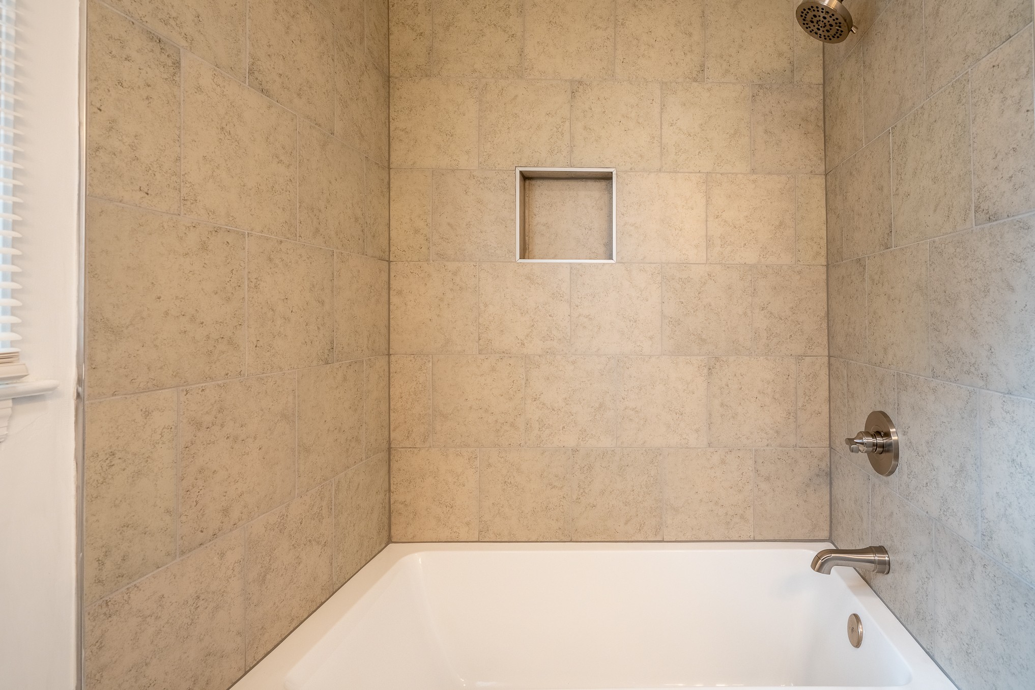 523 Highland Avenue Pulaski, TN 38478 - Photo 32 of 44 a bathroom with a bathtub