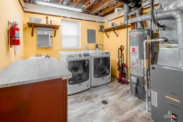 a utility room with dryer and washer