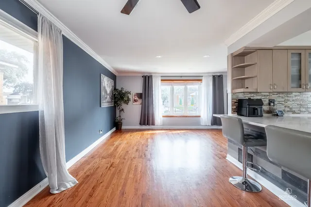 a view of livingroom with furniture wooden floor and window