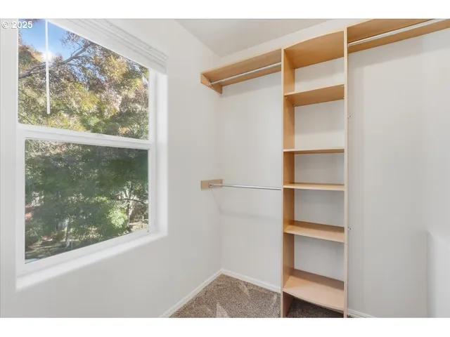 a bathroom with a sink toilet a mirror and shower