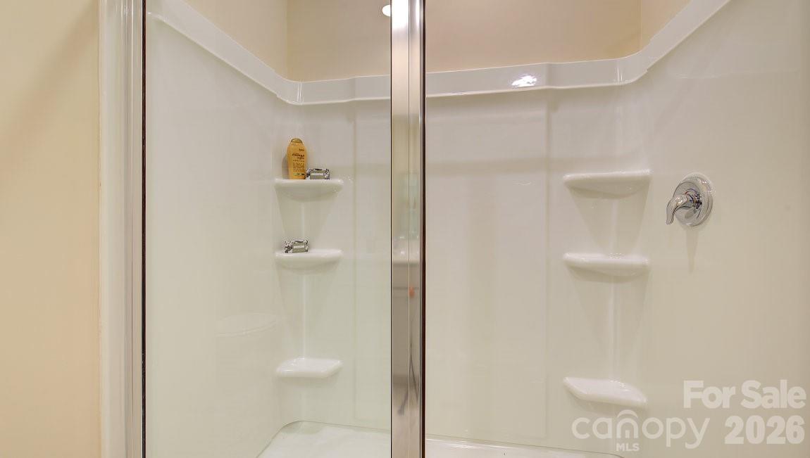 85 Salers Road Fletcher, NC 28732 - Photo 21 of 46 a bathroom with a shower