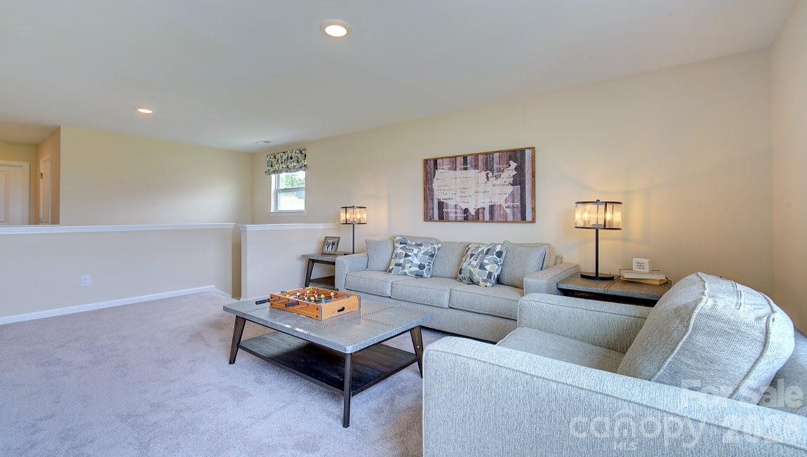 85 Salers Road Fletcher, NC 28732 - Photo 29 of 46 a living room with furniture and a table
