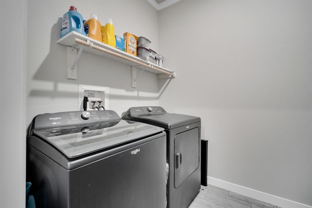 129 Old Blooming Grove Road Italy, TX 76651 - Photo 20 of 22 a utility room with dryer and washer