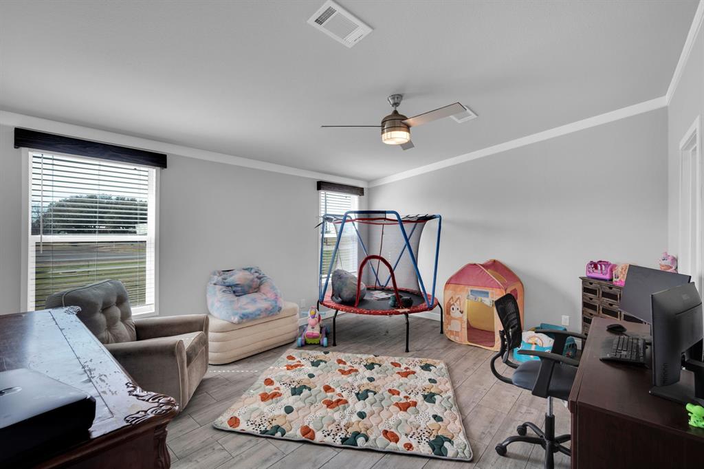 129 Old Blooming Grove Road Italy, TX 76651 - Photo 8 of 22 a living room with furniture a rug and a window