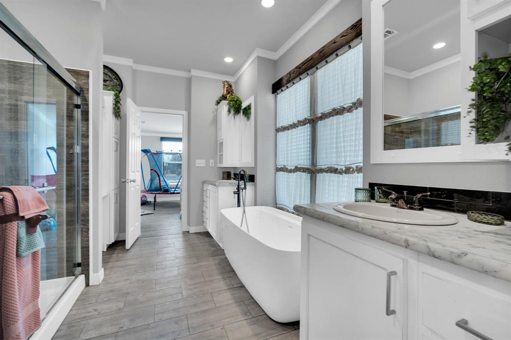 129 Old Blooming Grove Road Italy, TX 76651 - Photo 9 of 22 a large white kitchen with a sink and a large mirror