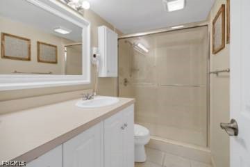 5600 Bonita Beach Road Southwest, Unit 503 Bonita Springs, FL 34134 - Photo 4 of 5 a bathroom with a sink and a mirror