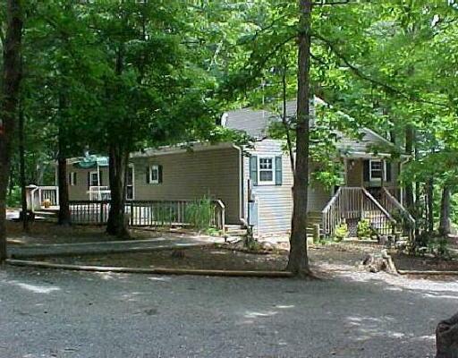 2135 6 Mile Post Road Callaway, VA 24067 - Photo 1 of 1 a view of a house with backyard and a tree