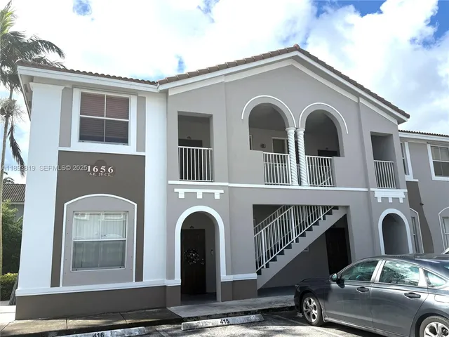 a front view of a house with windows