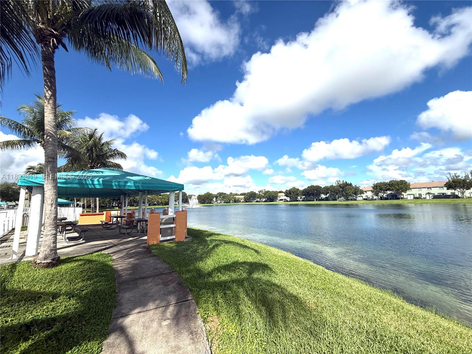 1656 Southeast 29th Court, Unit 207 Homestead, FL 33035 - Photo 28 of 31 a view of a lake