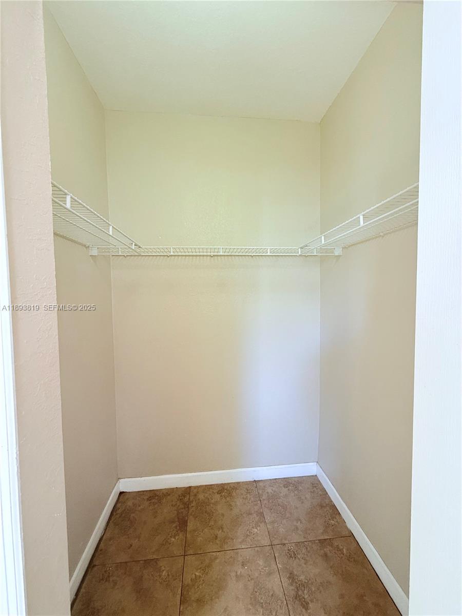 1656 Southeast 29th Court, Unit 207 Homestead, FL 33035 - Photo 9 of 31 a view of an empty room