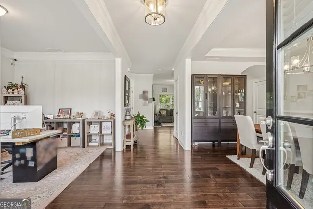 a view of a living room and dining room