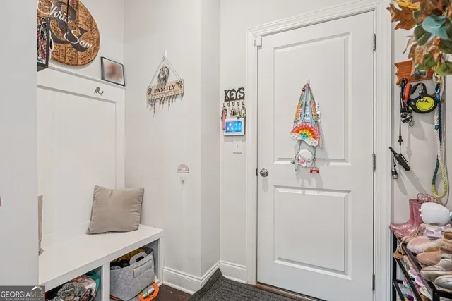 a room with cabinet and utility room