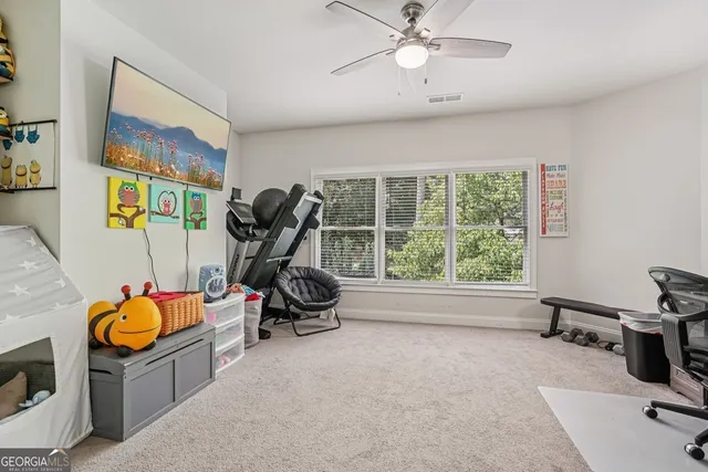 a room with furniture and a window