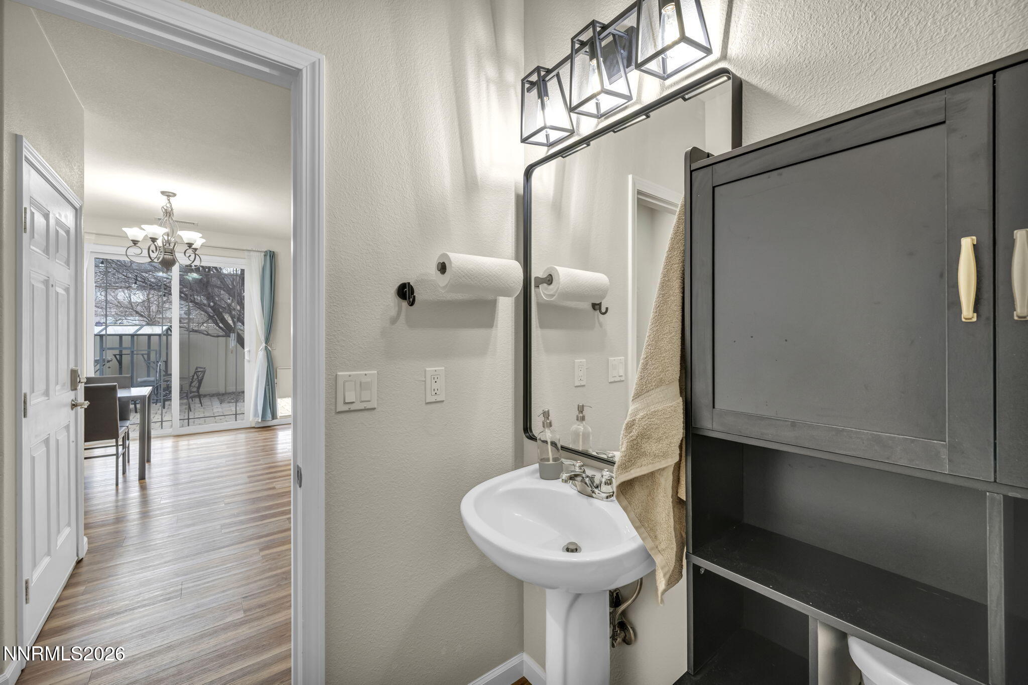 11010 Colton Drive Reno, NV 89521 - Photo 21 of 27 a bathroom with a sink a toilet and shower