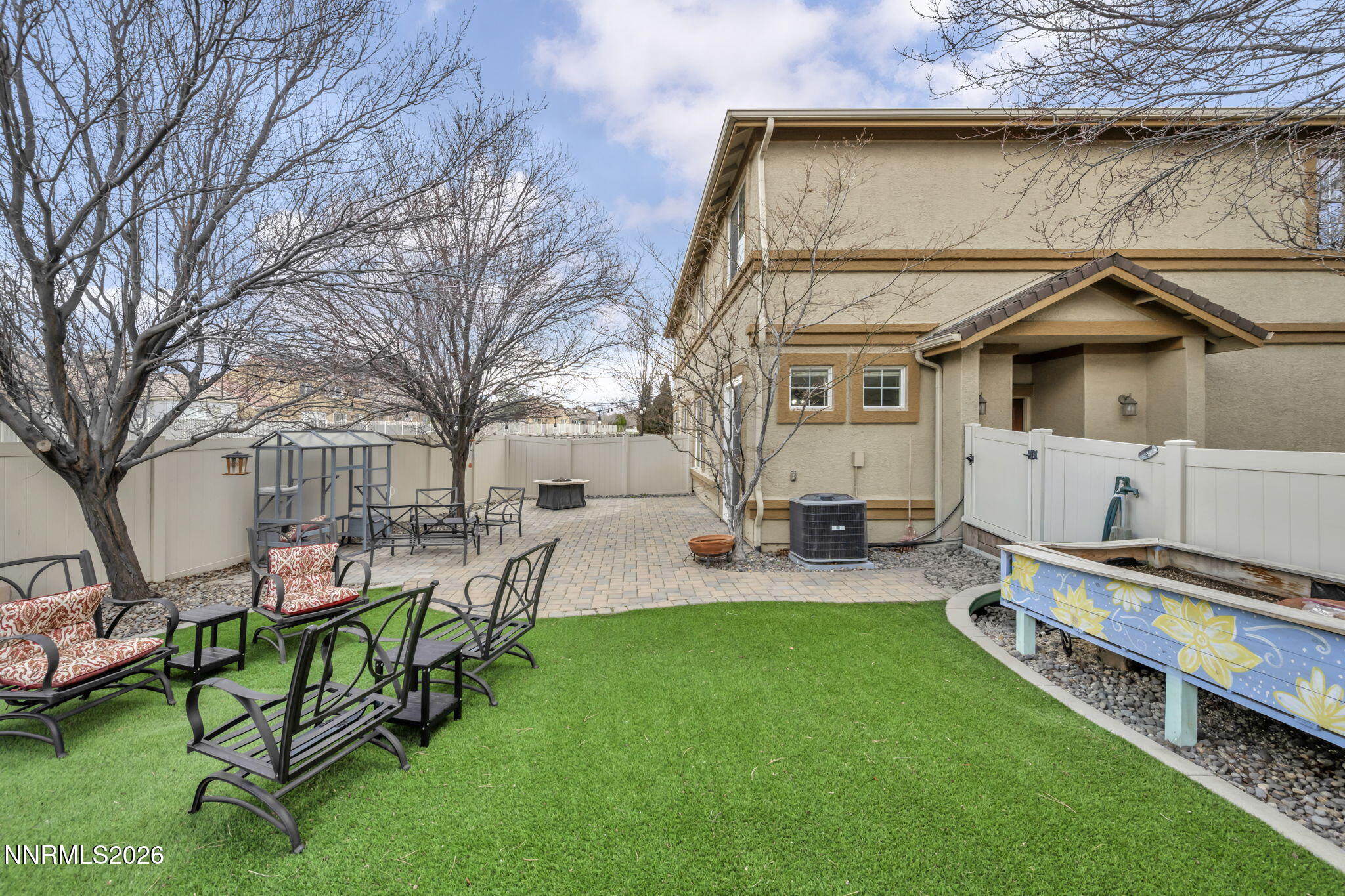 11010 Colton Drive Reno, NV 89521 - Photo 23 of 27 a view of a house with backyard porch and sitting area